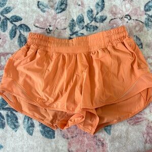 Size 6 lululemon sonic orange hotty hots